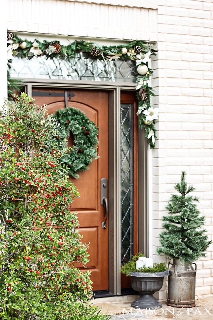 I love this simple, white and green look for the holidays! Classic greenery and white accents for a Christmas Front Porch | maisondepax.com