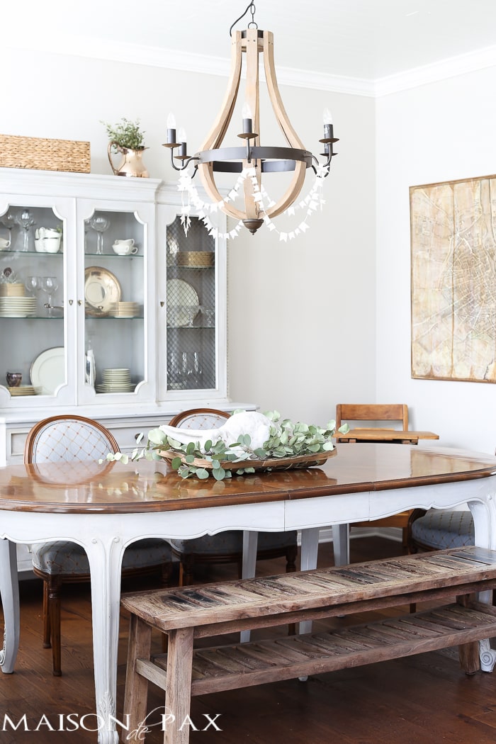 Ideas for Easter Decorating: gorgeous neutral dining room with rustic touches and a wine barrel chandelier | maisondepax.com