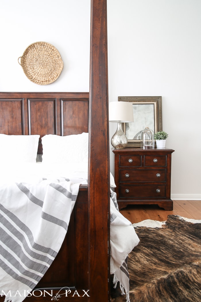 lovely, calming white master bedroom with natural wood tones and textures throughout | maisondepax.com